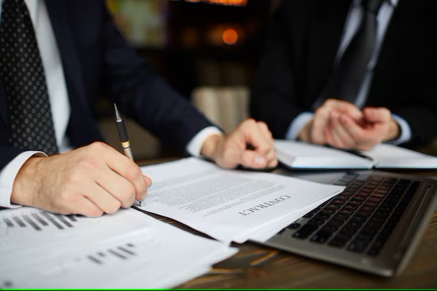 Professional lawyer in suit reviewing case files, symbolizing dedication to personal injury law.
