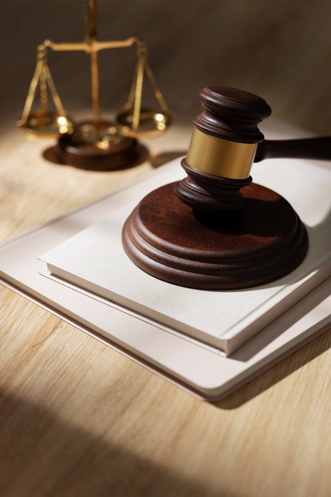 Professional lawyer in suit reviewing case files, symbolizing dedication to personal injury law.