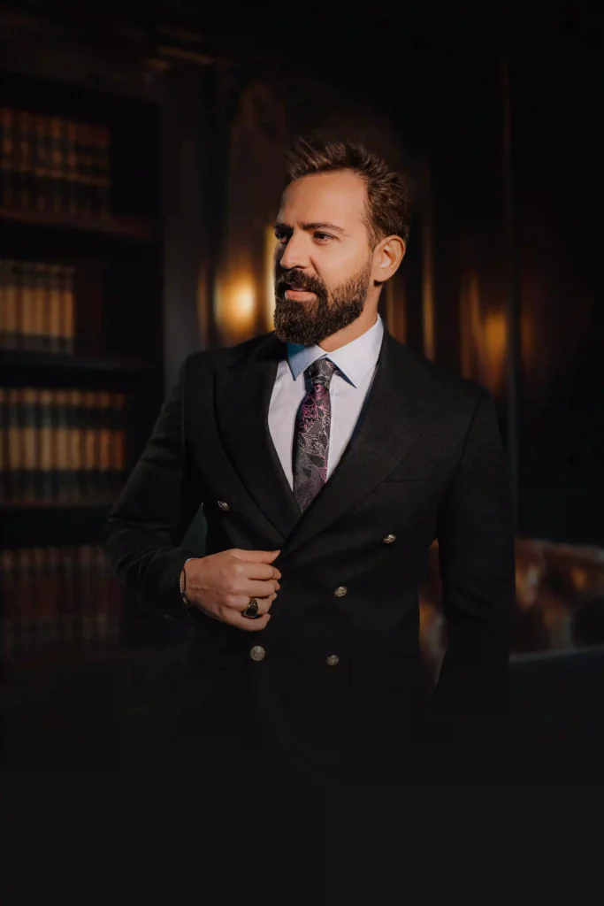 Professional lawyer in suit reviewing case files, symbolizing dedication to personal injury law.